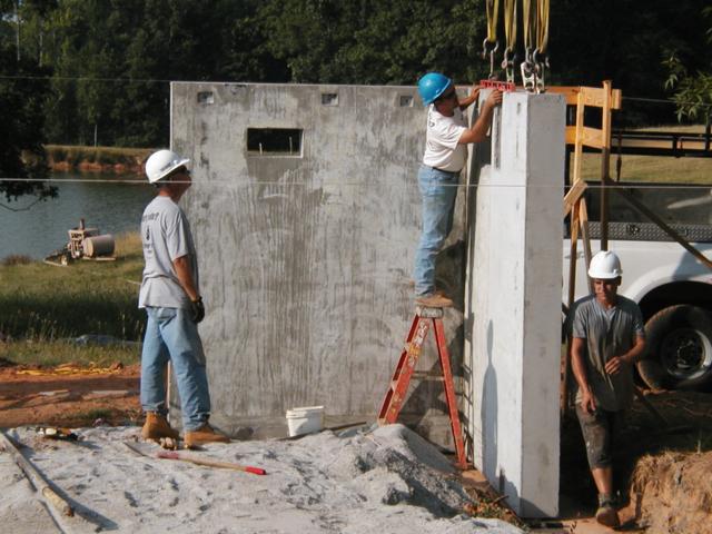 Custom precast vault structure — 10-inch solid wall panels with roof plank enclosure